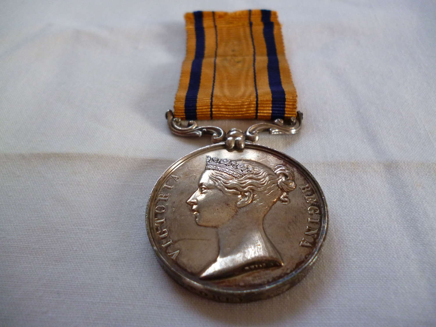 South Africa Medal 1855 named (G. Storey. 2nd Regt.). Queens Royal Reg