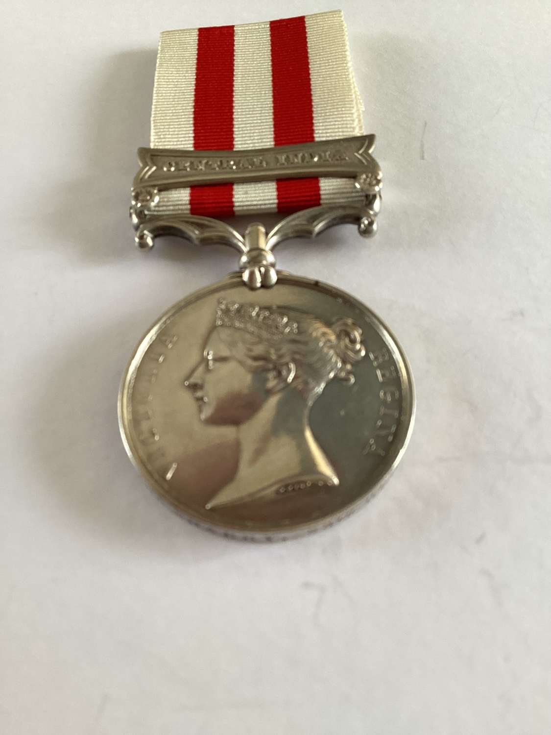 INDIAN MUTINY MEDAL AWARDED TO SERGEANT M. SHARRY, 1ST BATTALION, 88TH