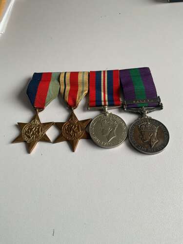 Four: Staff Quartermaster Sergeant F. McGhee, Bedfordshire and Hertfordshire Reg