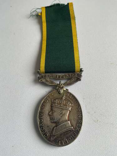 Efficiency Medal awarded to a Frmale Recipient